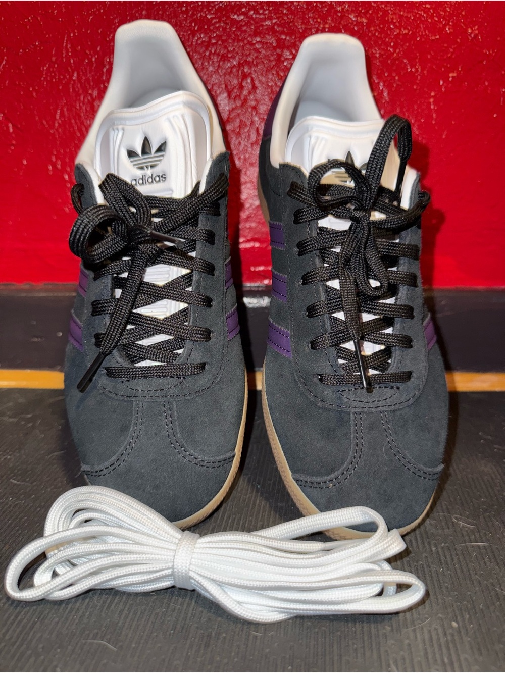122. NWT (no box) adidas Women’s Black Suede Sneakers with Purple Stripes